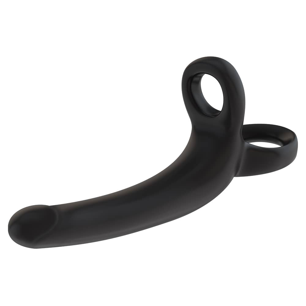Anillo para pene con dildo negro, diseñado para mejorar placer y erecciones con material suave y flexible.