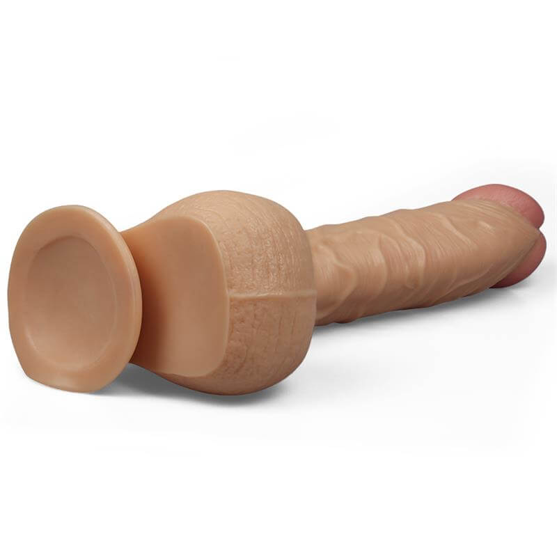 Dildo realista de gran tamaño con venas marcadas, testículos y ventosa, diseñado para una experiencia intensa y natural.