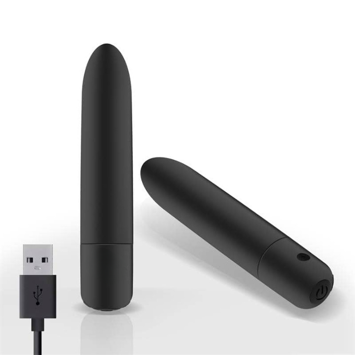 Bala vibradora pequeña con diseño alargado y punta redondeada, múltiples modos de vibración, recargable por USB e impermeable para uso cómodo y discreto.