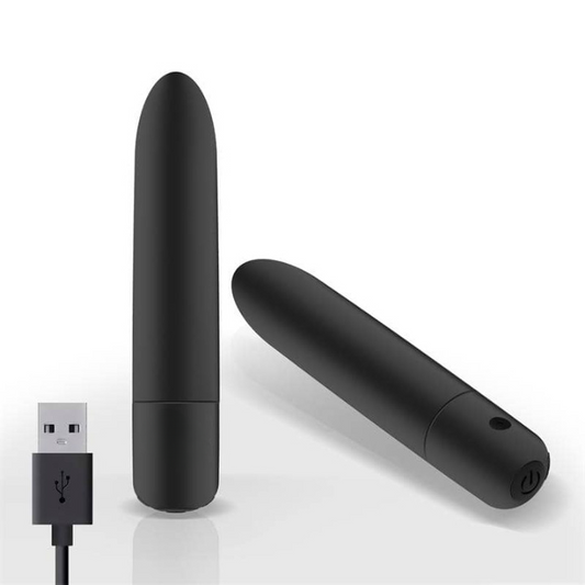 Bala vibradora pequeña con diseño alargado y punta redondeada, múltiples modos de vibración, recargable por USB e impermeable para uso cómodo y discreto.