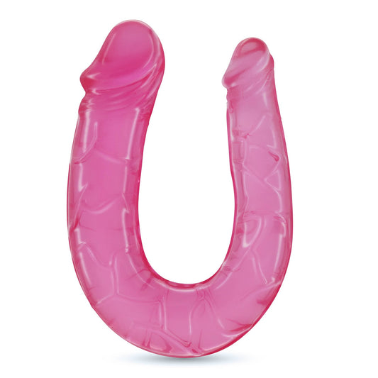 Dildo doble con textura realista, glandes definidos y goma flexible para doble penetración.