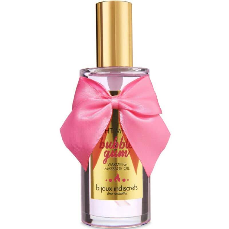 Aceite de masaje calentador Bubblegum en botella con lazo rosa, ideal para juegos eróticos en pareja.